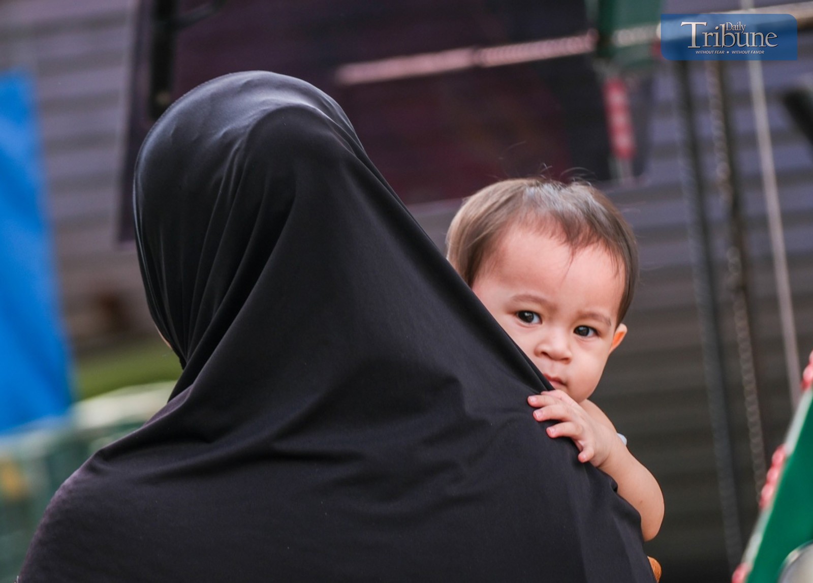 Mom and child heading to mosque