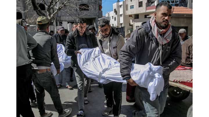 Deaths at aid delivery site: Shooting or stampede?