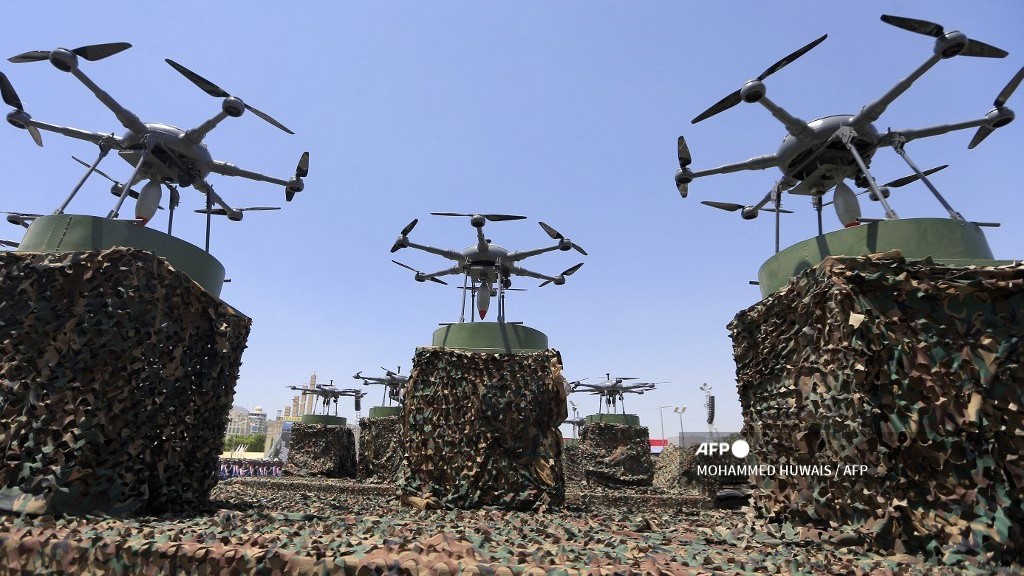 (FILES) Drones are displayed on the back of a vehicle during an official military parade marking the ninth anniversary of the Houthi takeover of the capital, Sanaa, on 21 September 2023.
