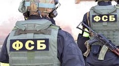Russia arrests four plotting to poison troops