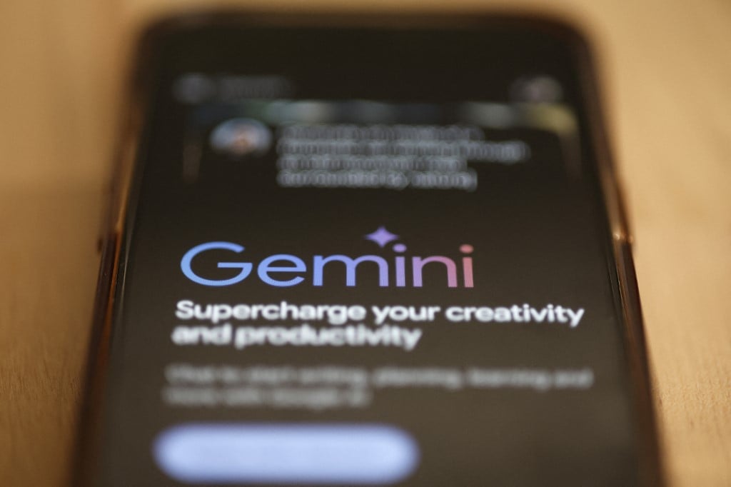 In this photo illustration, Gemini Ai is seen on a phone on 18 March 2024 in New York City. Apple announced that they're exploring a partnership with Google to license the Gemini AI-powered features on iPhones with iOS updates later this year. Google already has a deal in place with Apple to be the preferred search engine provider on iPhones for the Safari browser.
