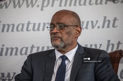 Haiti PM agrees to leave in regional push to end crisis
