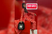 ISSA Pressman in Kenzo Flower Camo woven cardigan.
