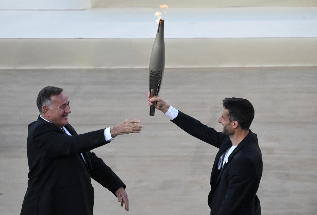 Greece hands Olympic flame to 2024 Paris Games hosts