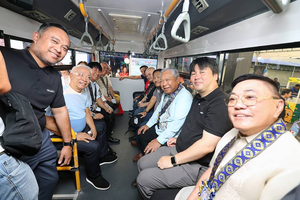 No less than Transportation Secretary Jaime Bautista (third from right) and Isuzu executives try out the Centro.