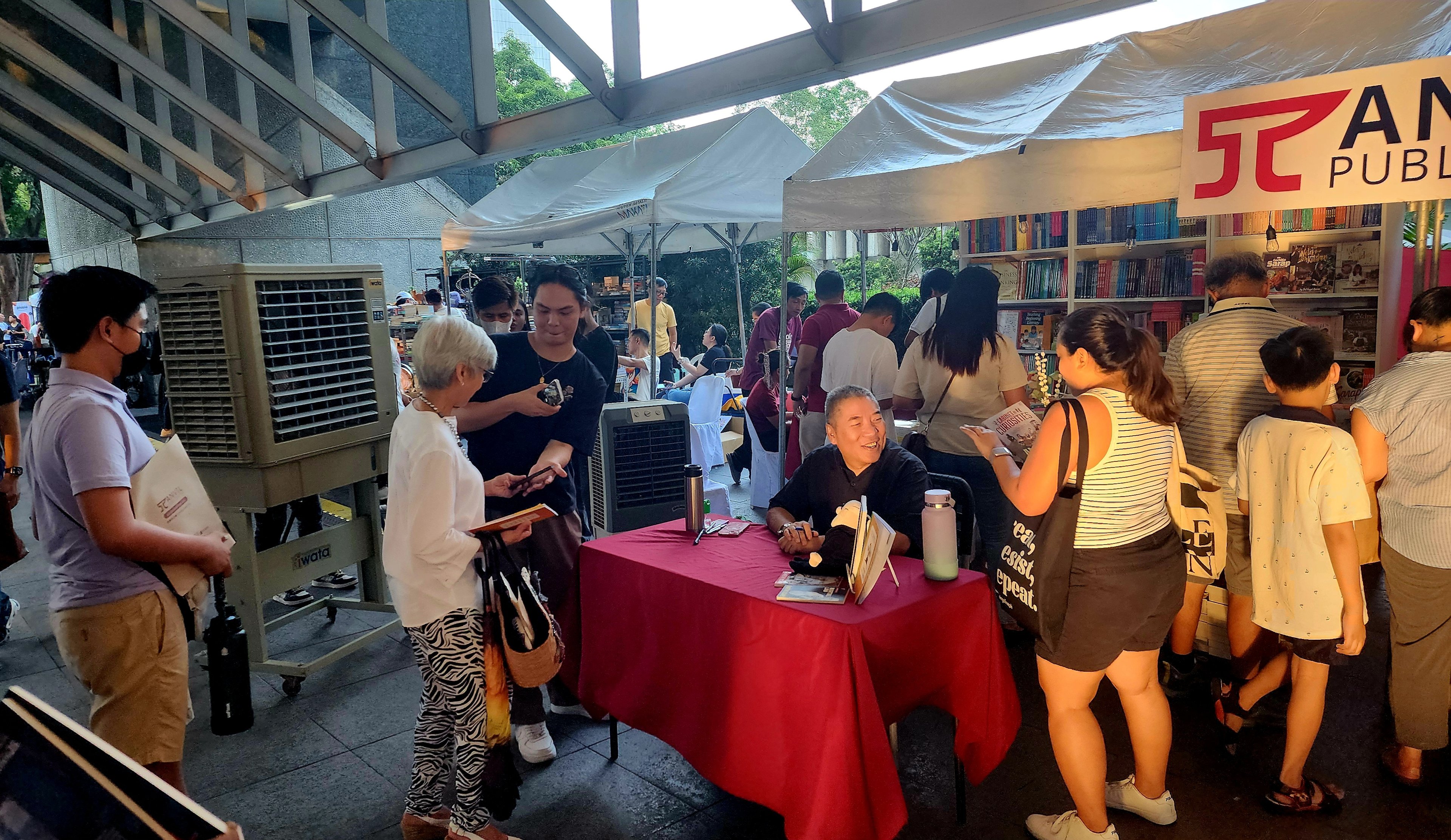 Historian Ambeth Ocampo at a book signing session.