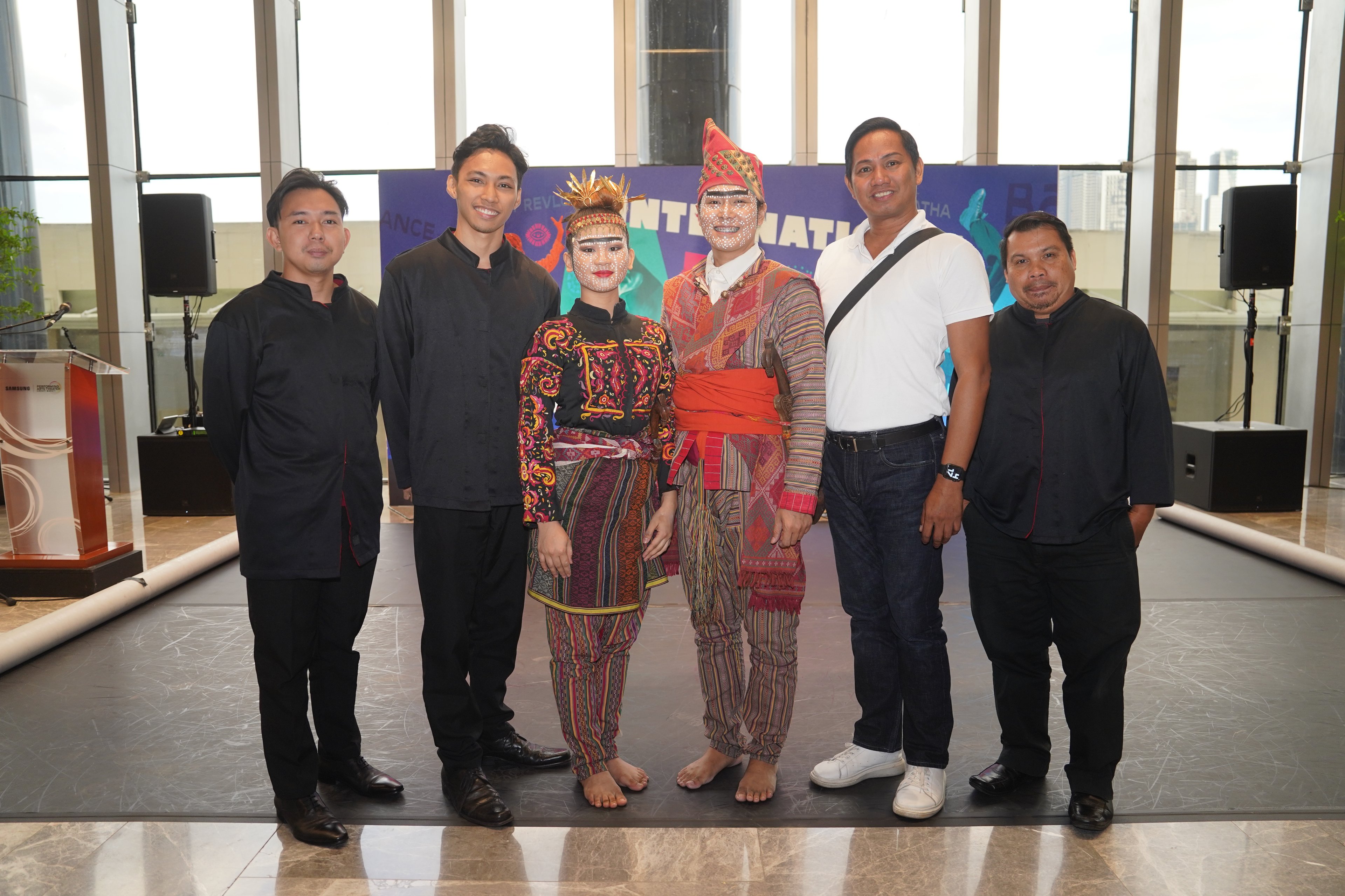 Ramon Obusan Folkloric Group performers and Lyle Villahermosa, Ramon Obusan Folkloric Group dance director
