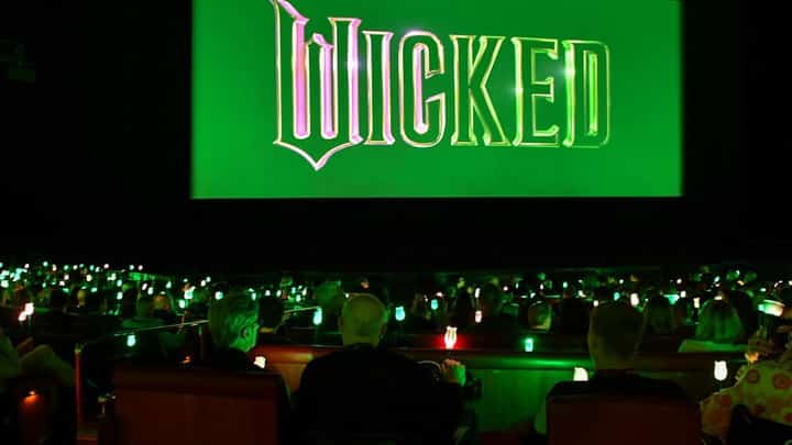 View of the public holding flowers during the presentation of Wicked during the Universal Pictures and Focus Features presentation at The Colosseum at Caesars Palace at CinemaCon 2024 in Las Vegas, Nevada, on 10 April 2024.