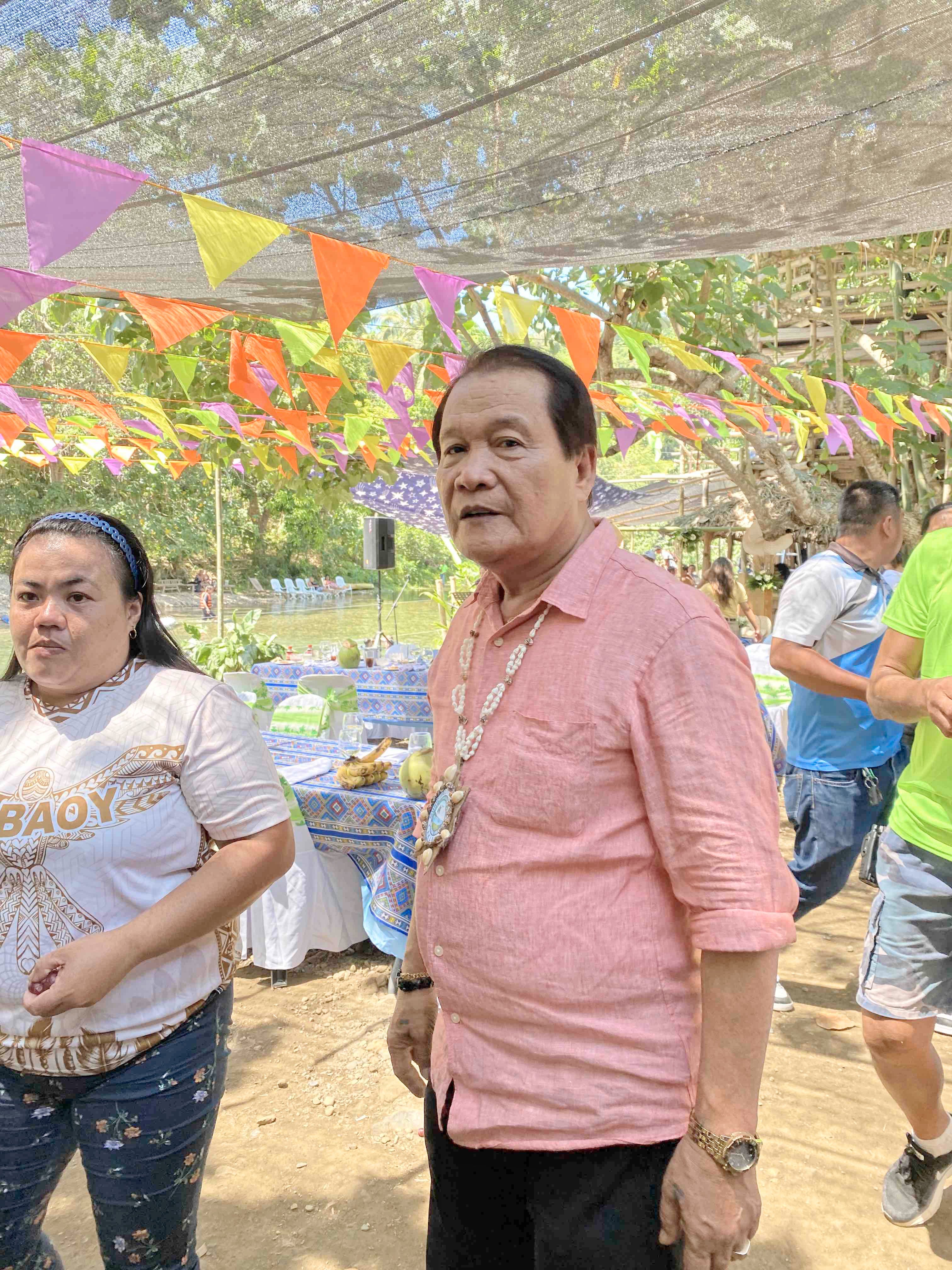 Malay Mayor Frolibar Bautista, wearing a pink polo.