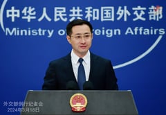 China tells Australia it ‘poses no threat’