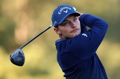 US stars duel Hojgaard for Masters lead as Tiger grinds on