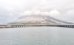 11,000 fleeing to island amid erupting volcano
