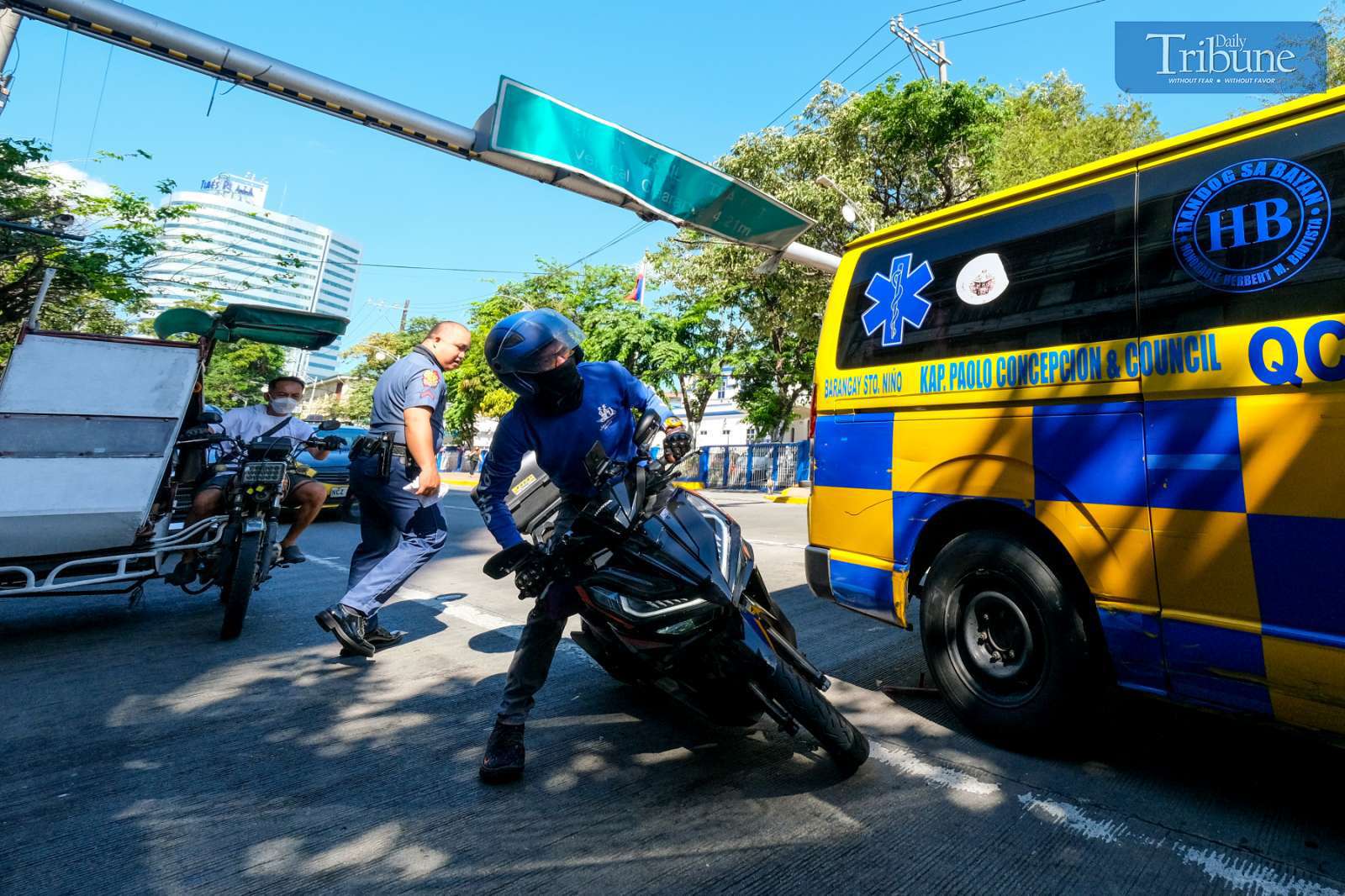 Motorcycle hits ambulance