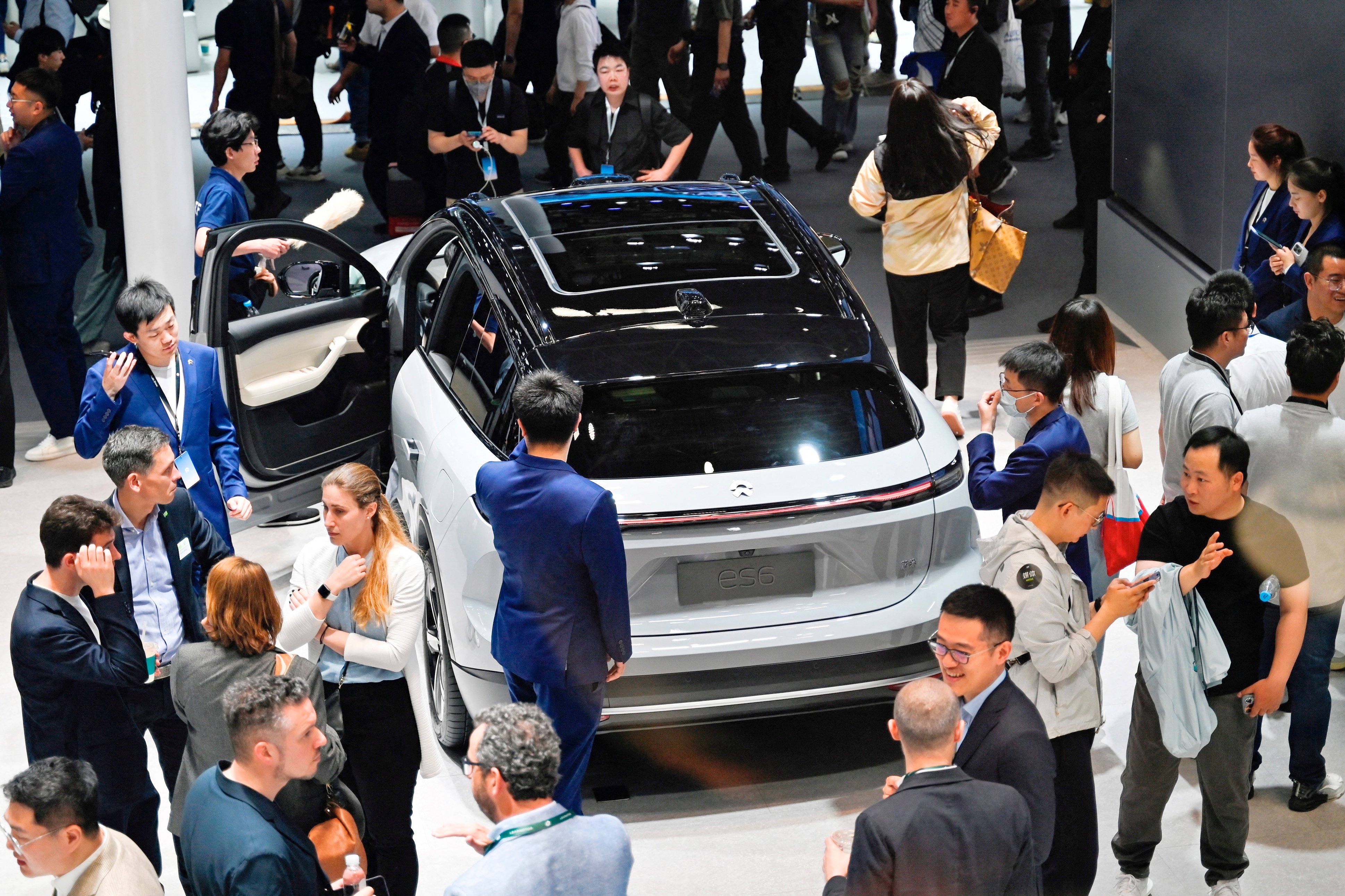 PEDRO PARDO/AGENCE FRANCE-PRESSE
THOUSANDS descend on Beijing for the Auto China Show.