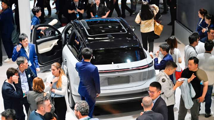 PEDRO PARDO/AGENCE FRANCE-PRESSE
THOUSANDS descend on Beijing for the Auto China Show.