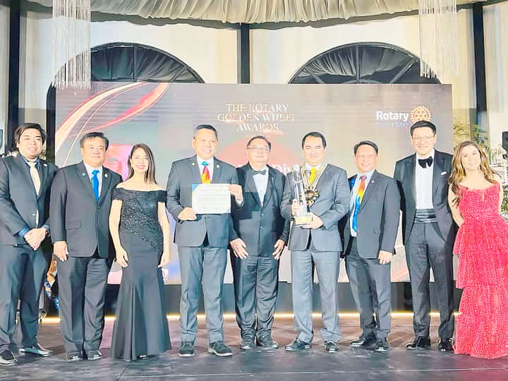 For his outstanding contributions to the legal profession, DivinaLaw managing partner Nilo T. Divina was honored by Rotary International 3780 with the Rotary Golden Wheel Award for Legal Practice. The Golden Wheel Award is bestowed on exemplary individuals best embodying the Rotary spirit of ‘Service Above Self,’ and upholding the Club's ‘4 Way Test’ guiding principles. Photo shows Golden Wheel awardee Atty. Divina (sixth from left) receiving the Award from Rotary officers (from left) Hope Creating president Paolo Sagana, district governor-elect Milo Lucenario, past president Joan Policarpio, Hope creating president Paul Macaraeg, district governor Paul Angel Galang, past district governor Rufino Policarpio, past president Robert Nazal and past district governor Bernadette Herrera.