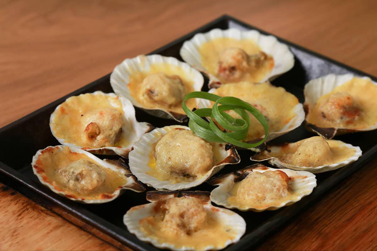 CHEESE-BAKED scallops