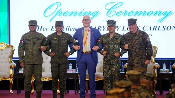 MGen Marvin L. Licudine PA, PH Exercise Director, and Gen Romeo S. Brawner Jr. PA, Chief of Staff, Armed Forces of the Philippines (AFP), along with U.S. Embassy Chargé d'Affaires Robert Ewing, MGen Noel D. Beleran PN(M), and LT Gen William M. Jurney USMC, US Exercise Director, linked arms Monday 22 April during the opening of the Philippines-United States Exercise Balikatan 39-2024 at the AFPCOC at Camp Aguinaldo in Quezon City. This marks the 39th iteration of Balikatan, the largest annual bilateral training exercise between the two Allies, running from 22 April to 10 May 10.