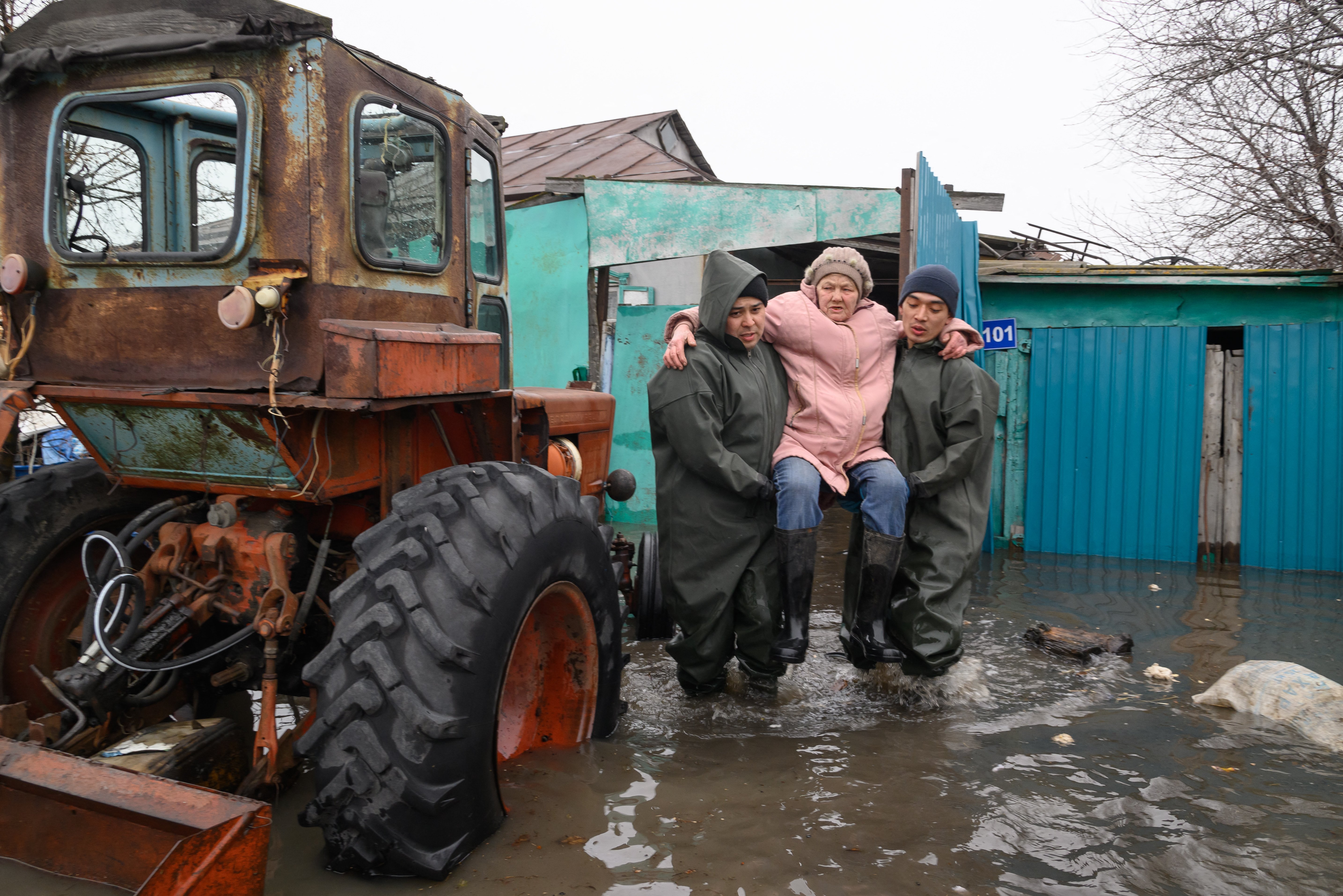 KAZAKH rescuers evacuate a resident of the flooded settlement of Pokrovka, some 90 kilometers from the city of Petropavl, in northern Kazakhstan close to the border with Russia. Water levels in overflowing rivers were still rising in swathes of Russia and Kazakhstan that have been hit by massive floods, with Russia’s city of Orenburg and western Siberia bracing for a new peak.