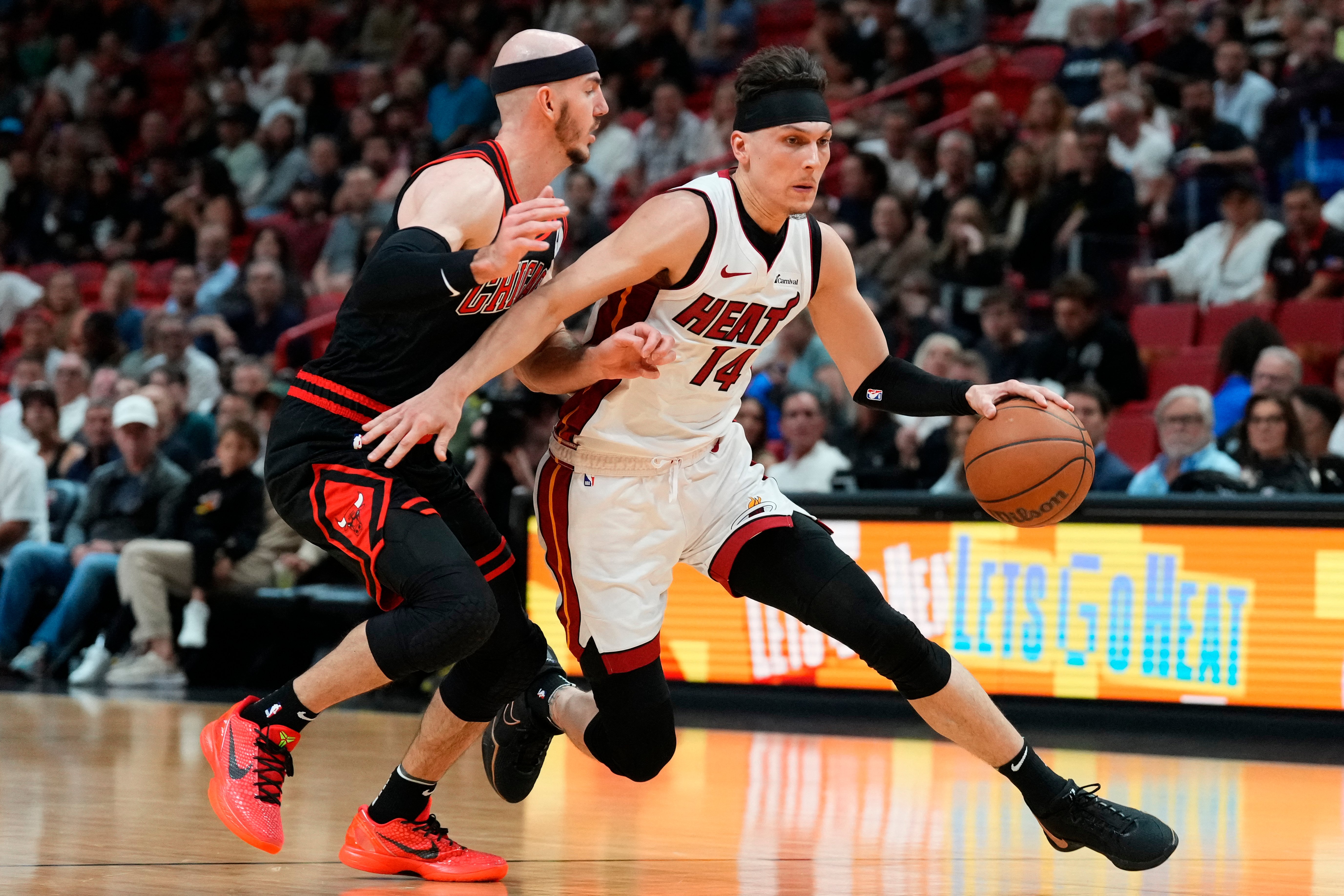 Tyler Herro and the Miami Heat get past Alex Caruso and the Chicago Bulls in their NBA play-in tournament game. The Heat won, 112-91.