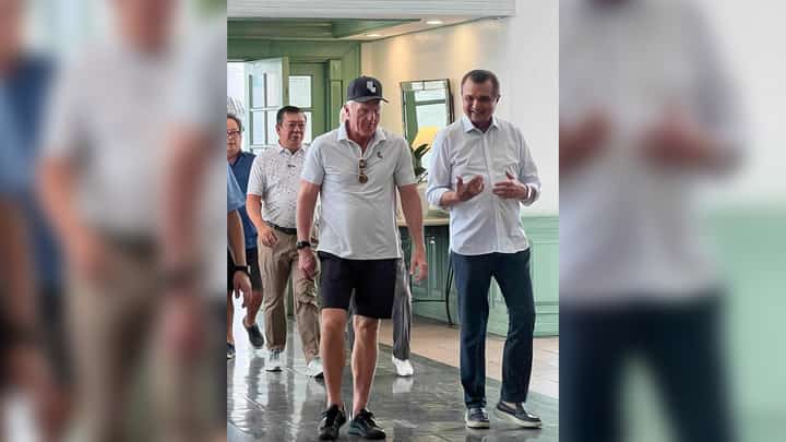 LIV Golf chief executive officer Greg Norman (left) gets a warm welcome from Manila Southwoods chairman Robert John Sobrepeña during his visit on Tuesday.