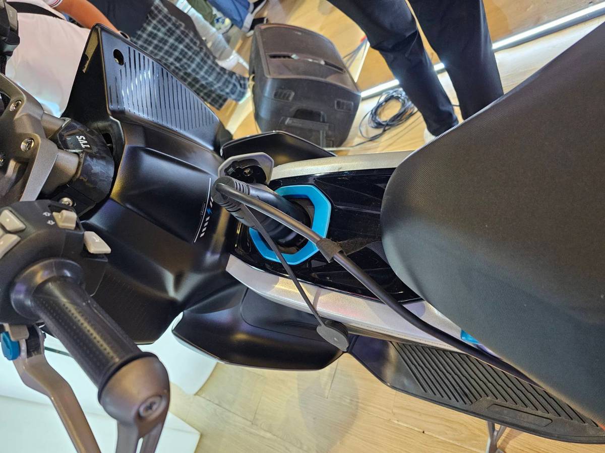 TVS X is shown charging.