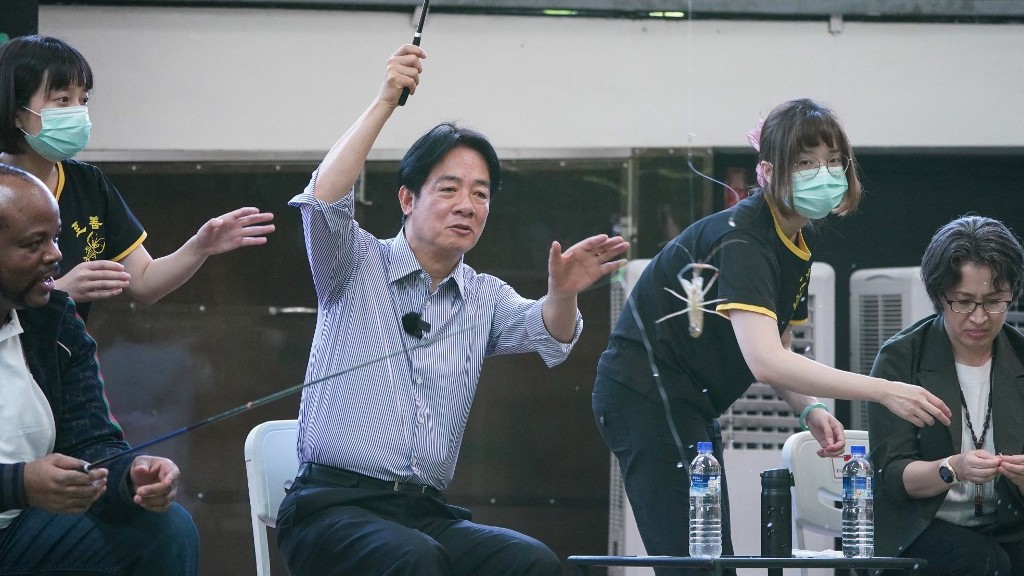 Taiwan's next president goes shrimp fishing with foreign guests