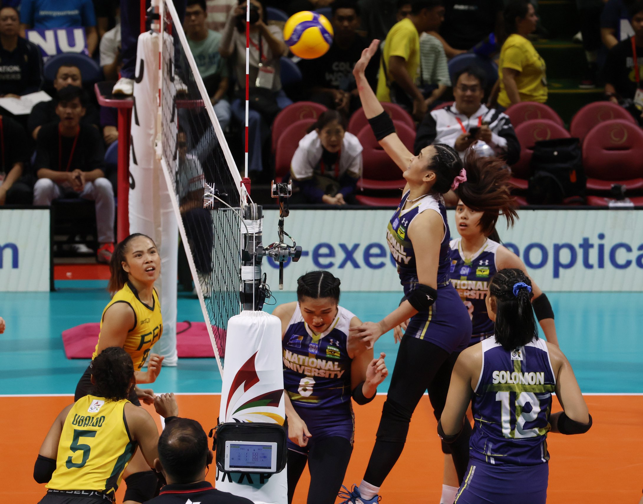 MICHAELA Belen of the NU Lady Bulldogs attacks the FEU Lady Tamaraws defense during their UAAP Season 86 women’s volleyball tournament game last night at the Smart Araneta Coliseum. The Lady Bulldogs prevailed, 25-13, 27-25, 25-15.
