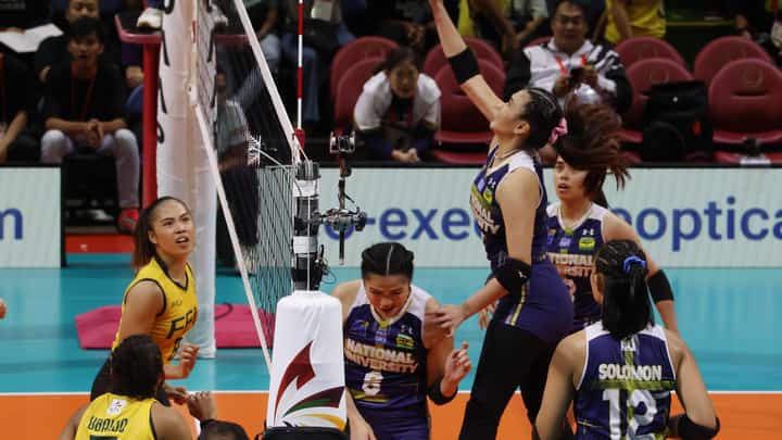 MICHAELA Belen of the NU Lady Bulldogs attacks the FEU Lady Tamaraws defense during their UAAP Season 86 women’s volleyball tournament game last night at the Smart Araneta Coliseum. The Lady Bulldogs prevailed, 25-13, 27-25, 25-15.
