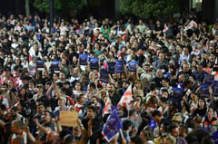 Tens of thousands rally in Georgia against 'foreign influence' bill