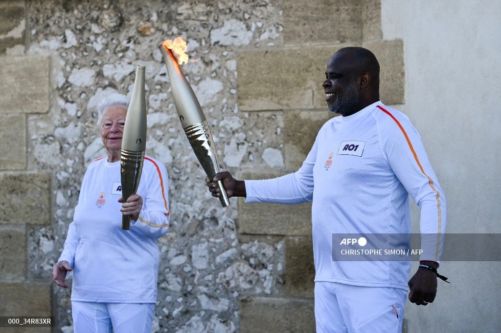 Paris Olympic flame begins relay across France