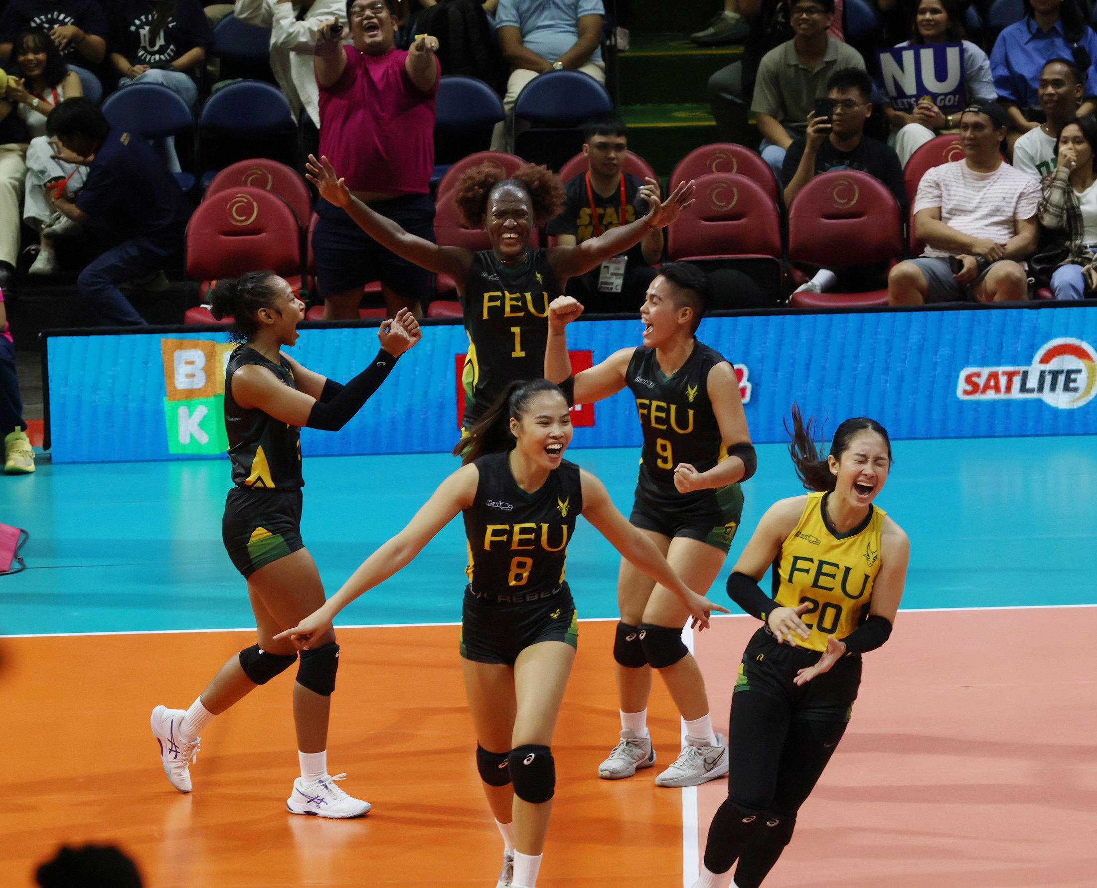 The Far Eastern University Lady Tamaraws celebrate their 25-23, 25-17, 25-23 victory over top-seed National University in their UAAP Season 86 women’s volleyball tournament Final Four at the Smart Araneta Coliseum.