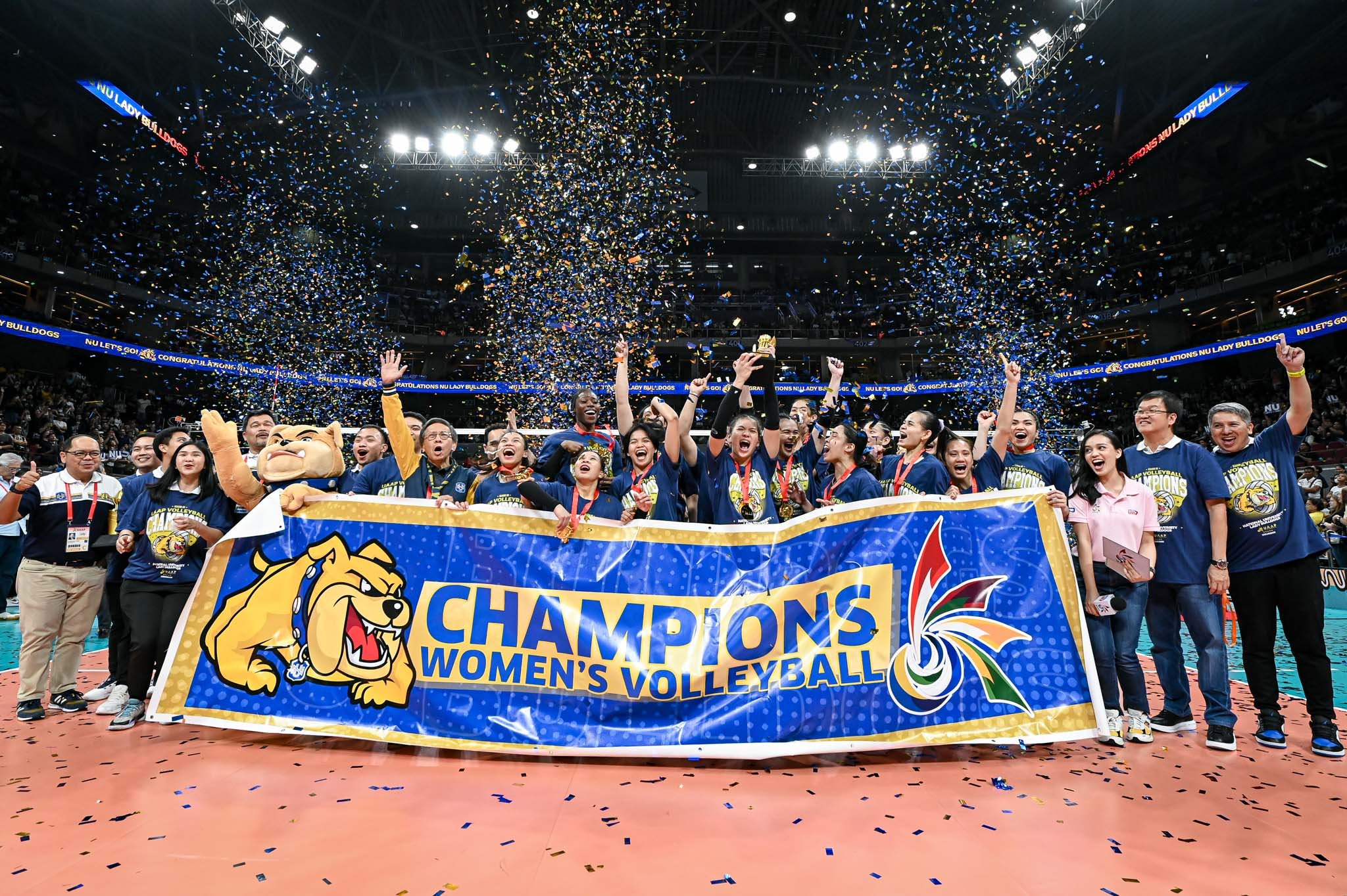 PHOTOGRAPH COURTESY OF UAAP
MEMBERS of the NU Lady Bulldogs celebrate after beating the UST Tigresses to capture the Season 86 UAAP women’s volleyball title last night at the Mall of Asia Arena.