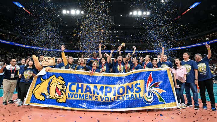 PHOTOGRAPH COURTESY OF UAAP
MEMBERS of the NU Lady Bulldogs celebrate after beating the UST Tigresses to capture the Season 86 UAAP women’s volleyball title last night at the Mall of Asia Arena.