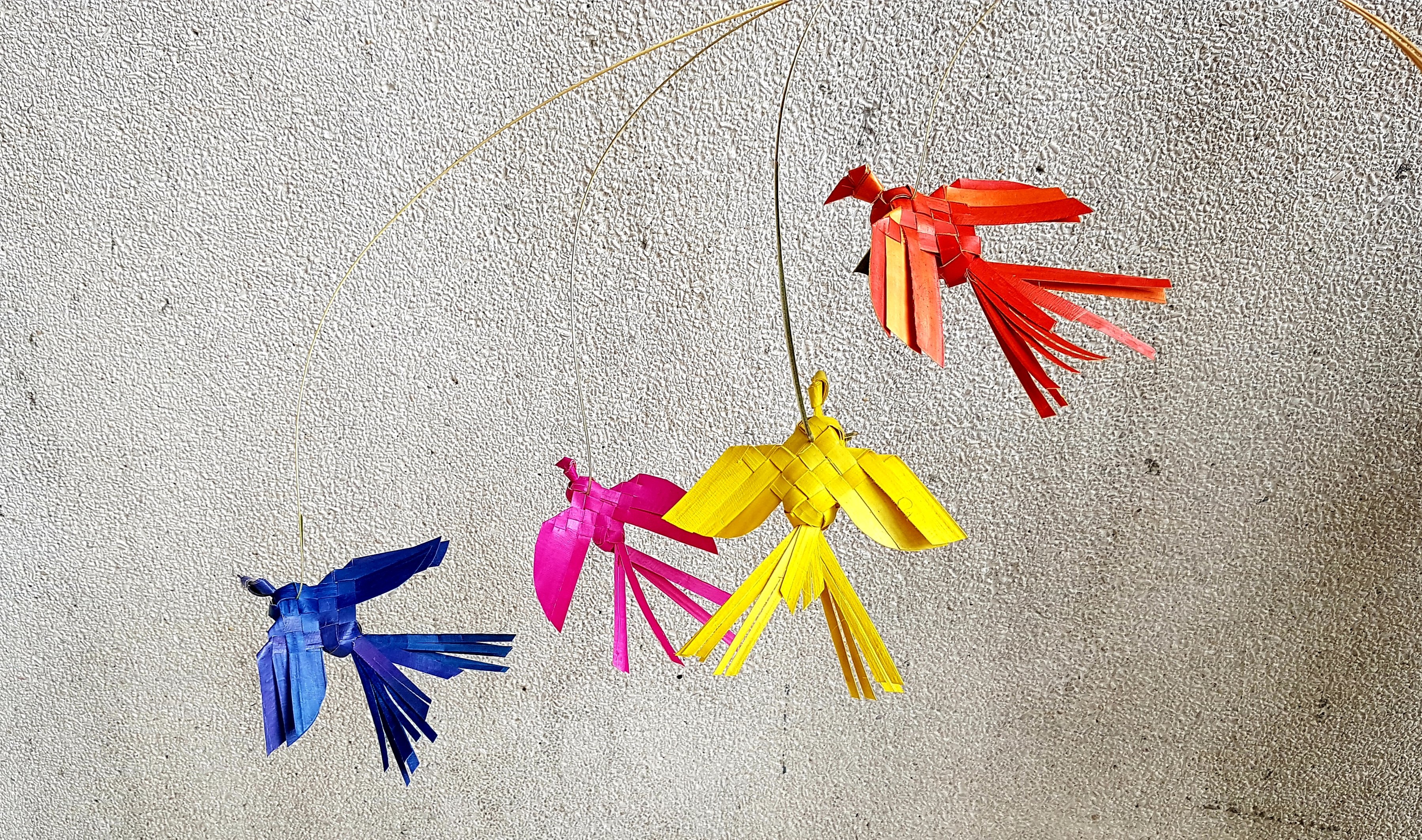 BIRDS of puni, made from coconut leaves.