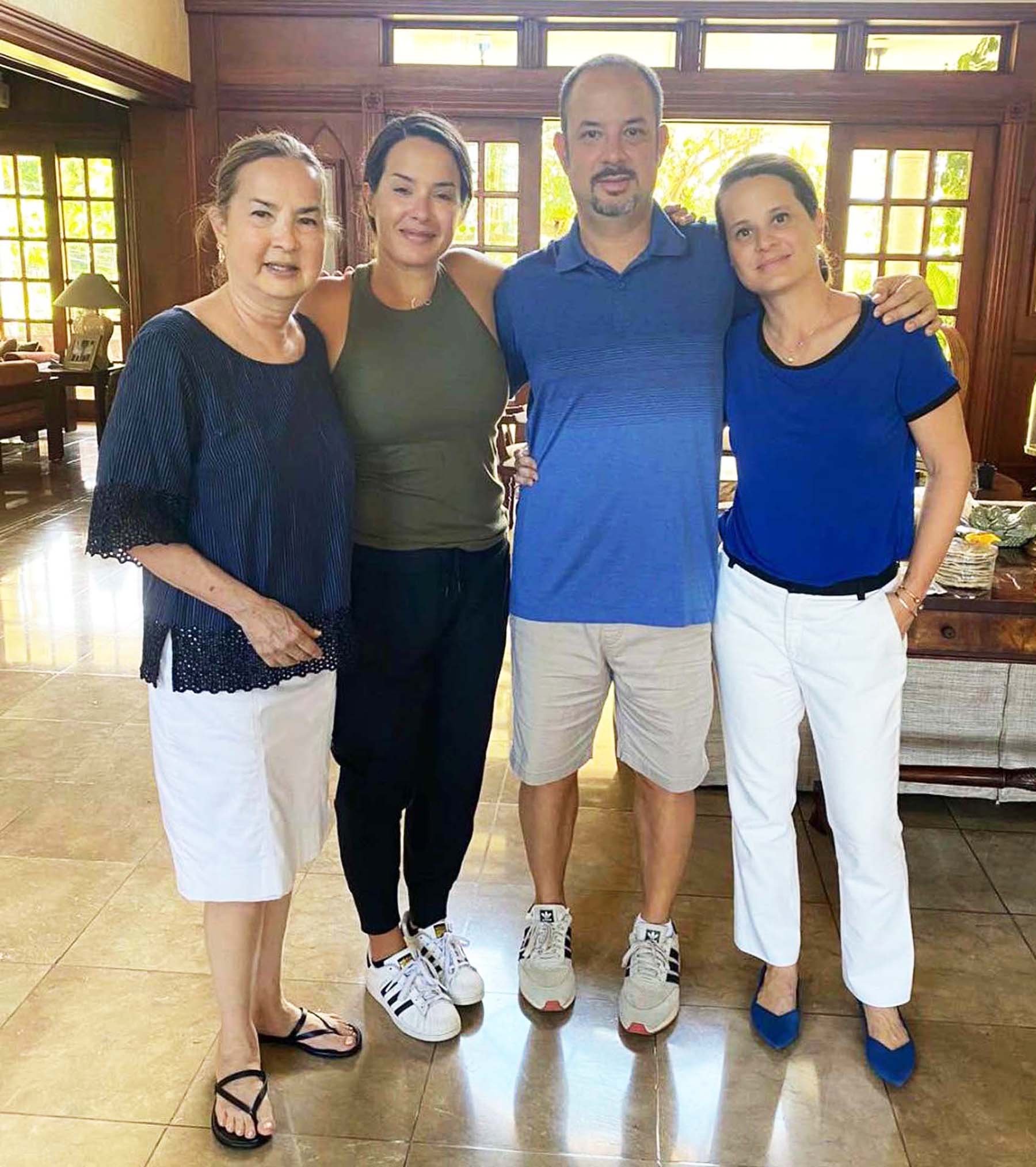 THERESE Gonzalez with her children Adrianne, Marc and Aimil.