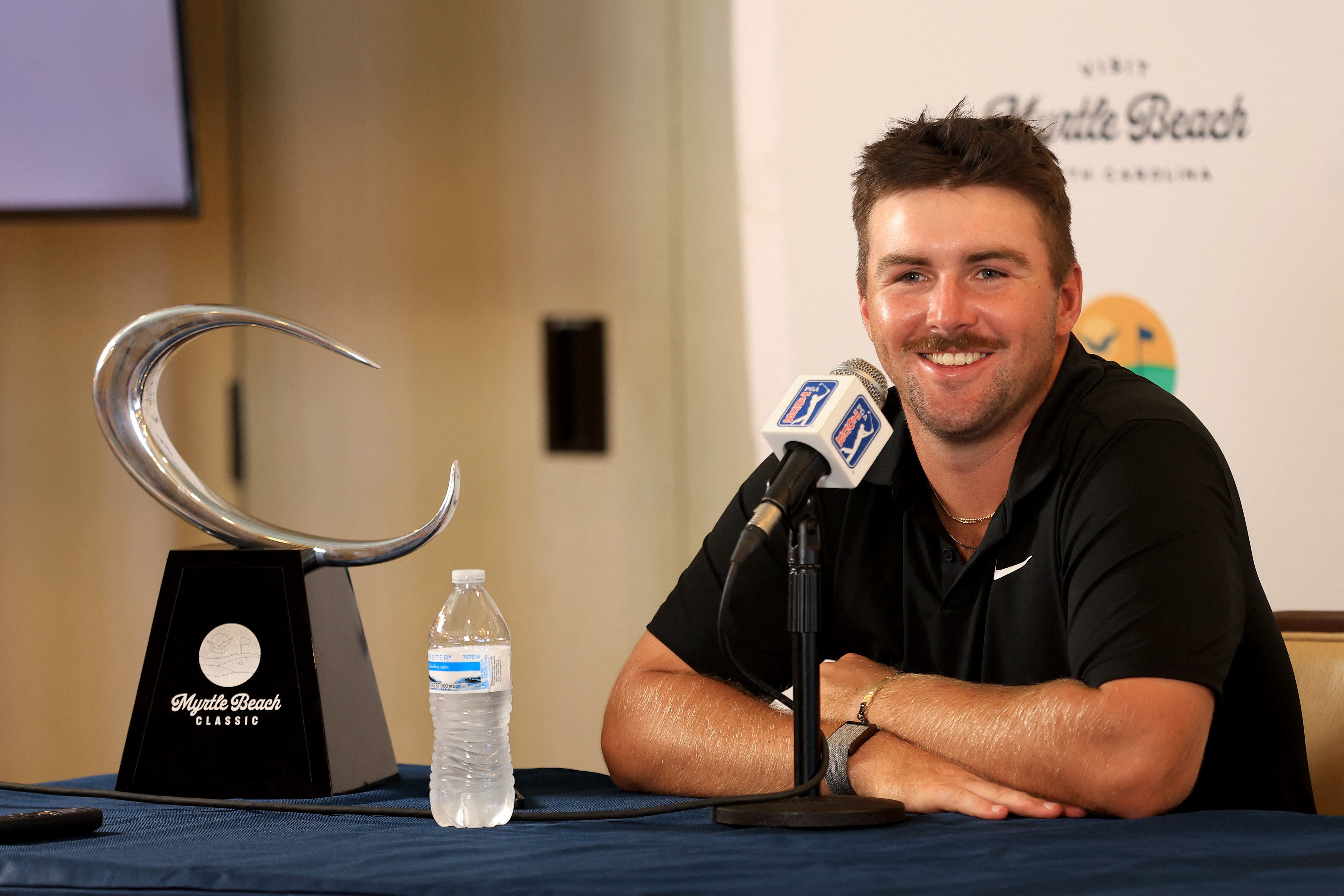 MYRTLE BEACH, SOUTH CAROLINA - MAY 12: Chris Gotterup speaks to the media following his victory at the Myrtle Beach Classic at Dunes Golf & Beach Club on May 12, 2024 in Myrtle Beach, South Carolina.