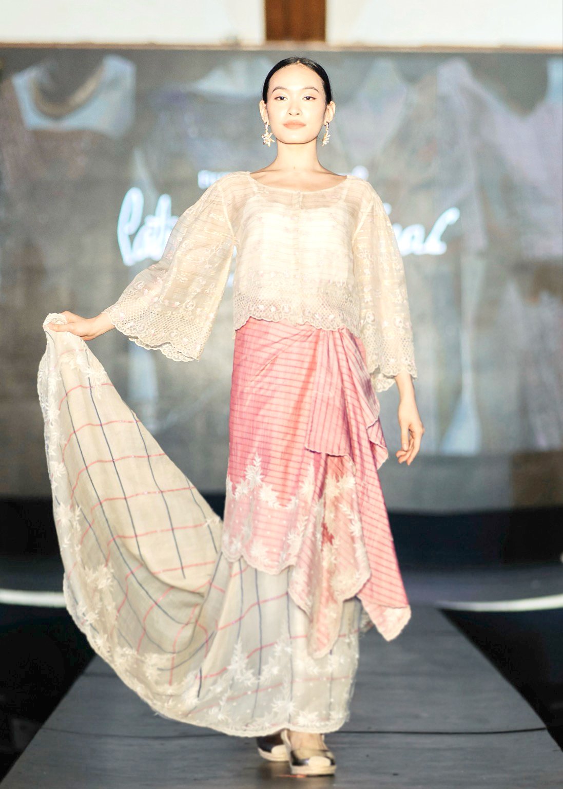 Hand-embroidered suksuk Maria Clara with pink silk tapis, embellished with machine embroidered white tulle, piña suksuk serpentina also with machine embroidered white tulle.
