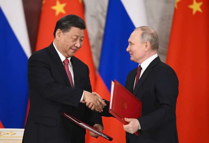 Putin visiting Beijing