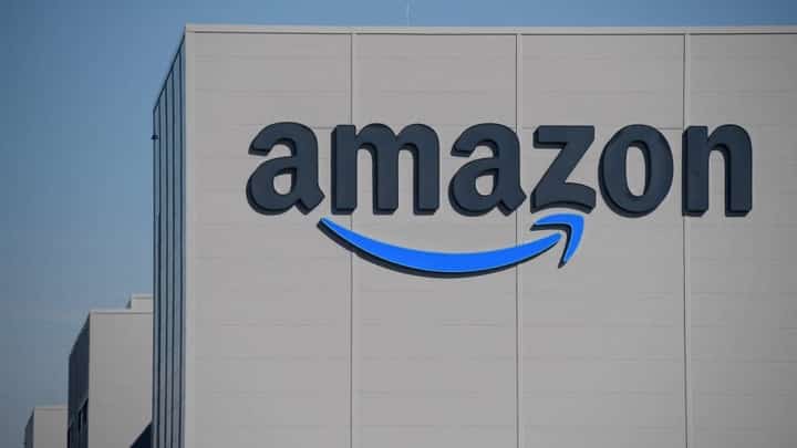 FILE PHOTO: The US giant Amazon logo is pictured on the opening day of a new distribution center in Augny on 23 September 2021. Photo by SEBASTIEN BOZON / AFP