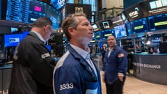US stocks dip after Dow tops 40,000 for first time
