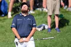 SIZZLING SHOTMAKING: Lowry fires 62; Schauffele, Morikawa share lead