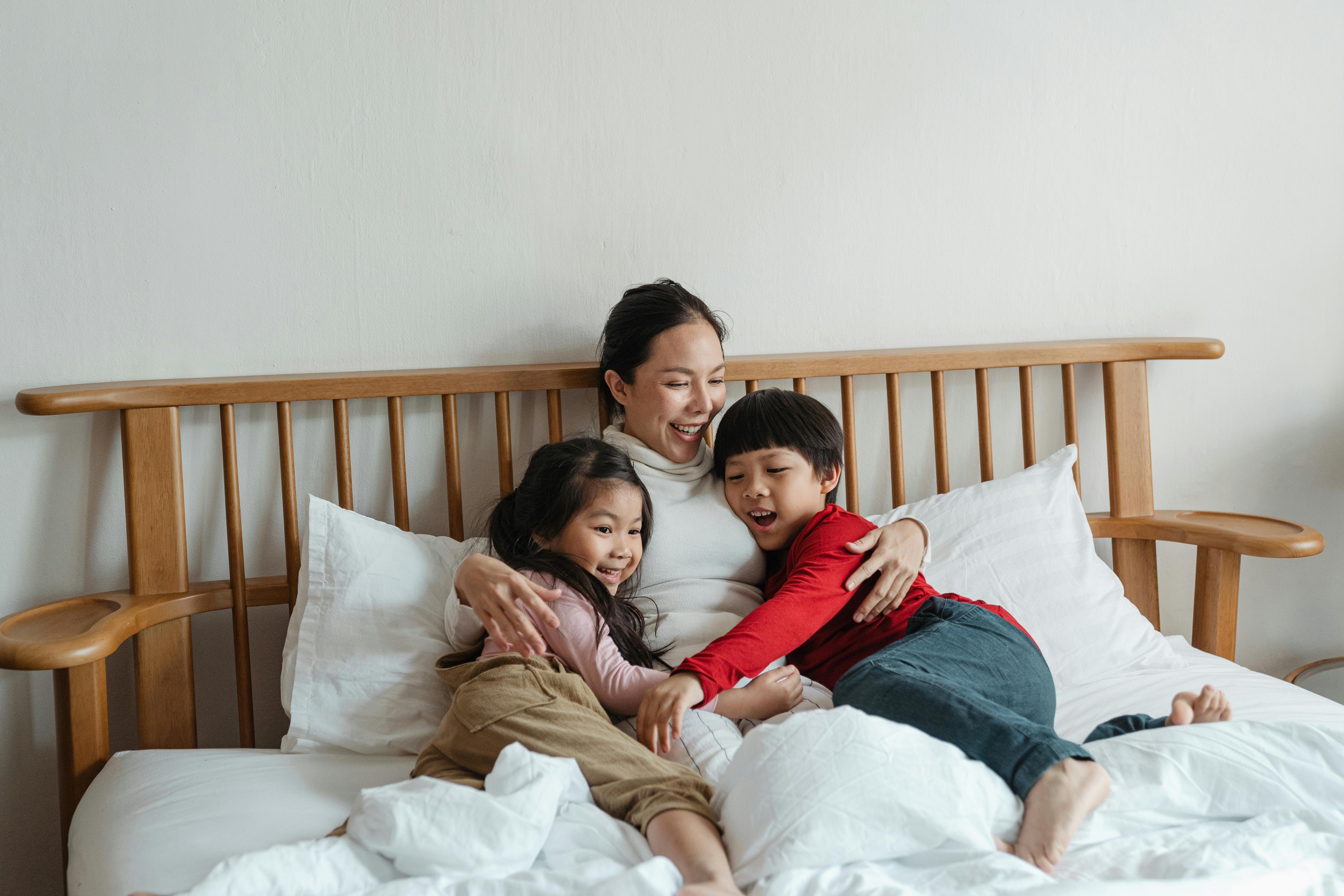 MOM sleeping with kids.