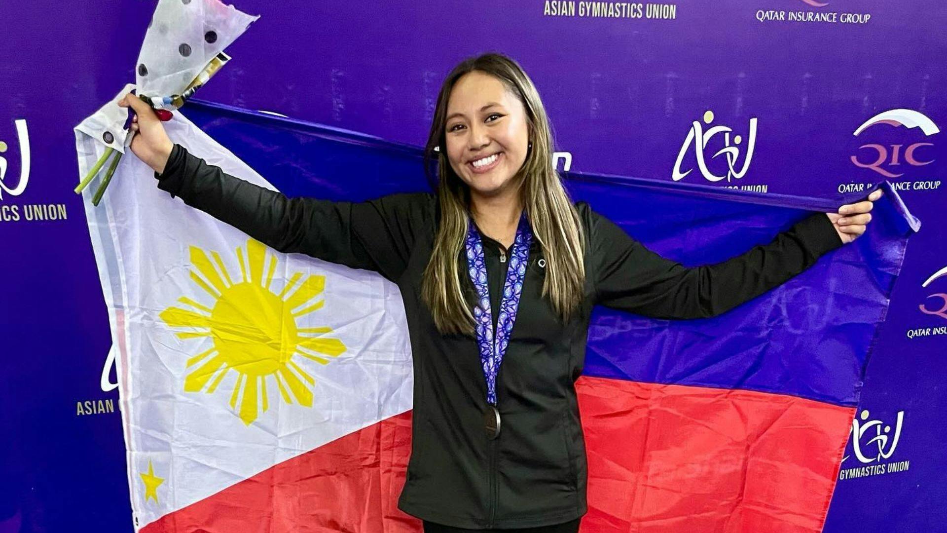 Gymnast Emma Malabuyo proudly shows off her roots after making the 2024 Paris Olympics.