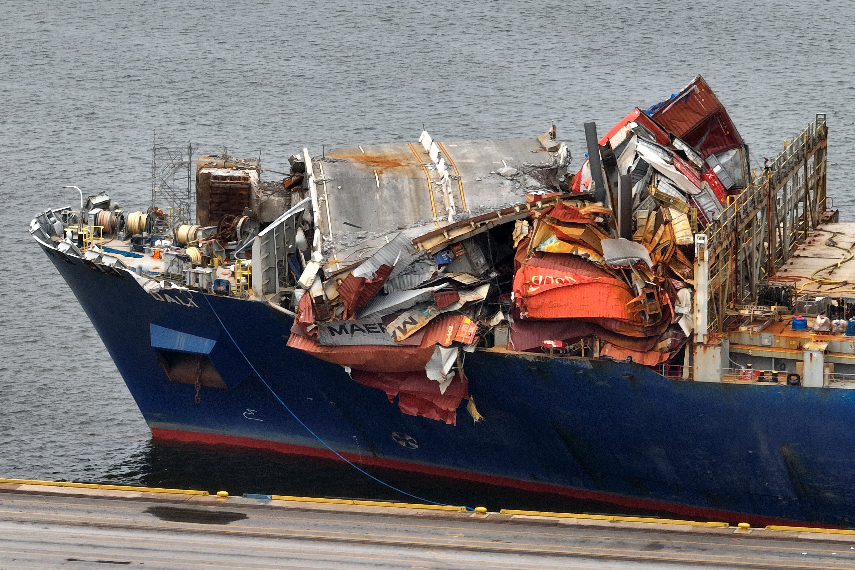 Cargo ship that destroyed Baltimore bridge towed to port
