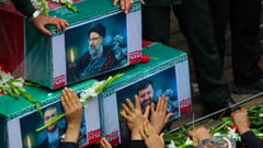 Iranians pay last respects to president