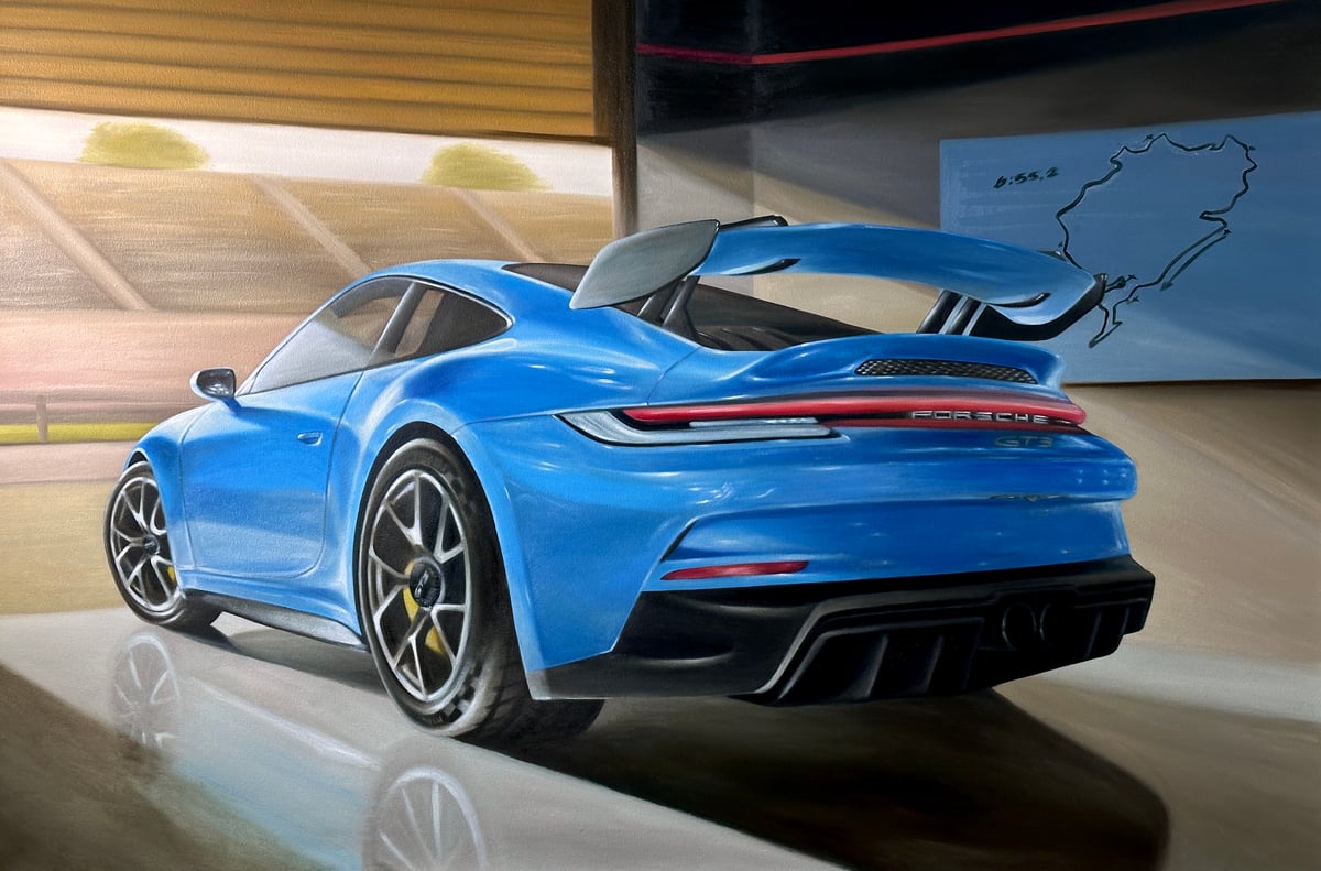 ‘GT3 at the Nurburgring’ 2024  The owner had this piece commissioned after he was able
to acquire his dream car: The Porsche 911 GT3 Two things he requested; he wanted the backend of the Porsche and a garage setting.