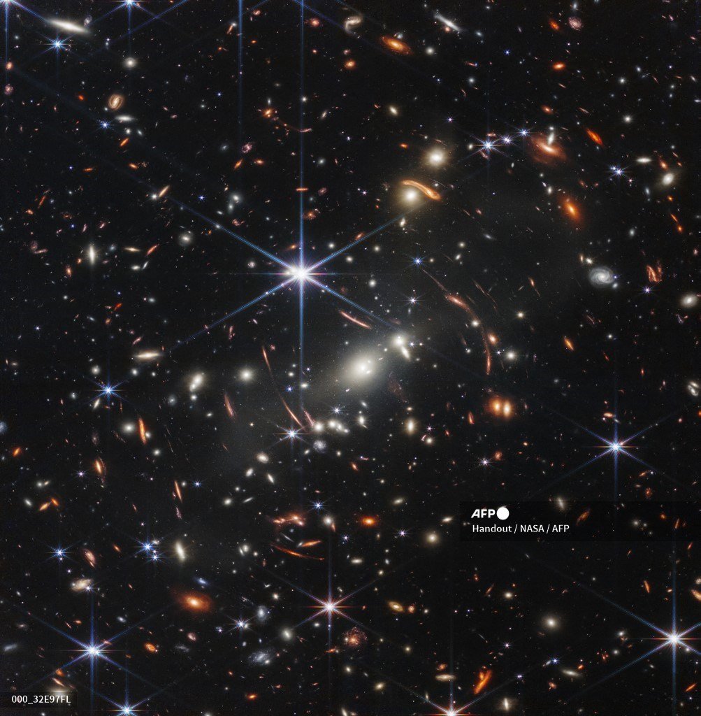 In this handout photo from NASA obtained on July 11, 2022, the first infrared image from the James Webb Space Telescope (JWST) is seen. The JWST is the most powerful telescope launched into space and it reached its final orbit around the sun, approximately 930,000 miles from Earths orbit, in January, 2022. The technological improvements of the JWST and distance from the sun will allow scientists to see much deeper into our universe with greater detail.
