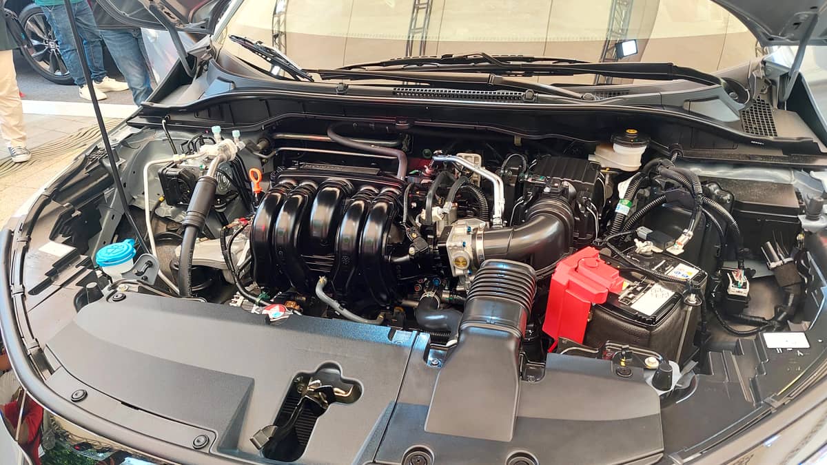 Cute as a bug A 1.5-liter, four-cylinder, double overhead cam i-VTEC engine carries the Honda City Hatchback.