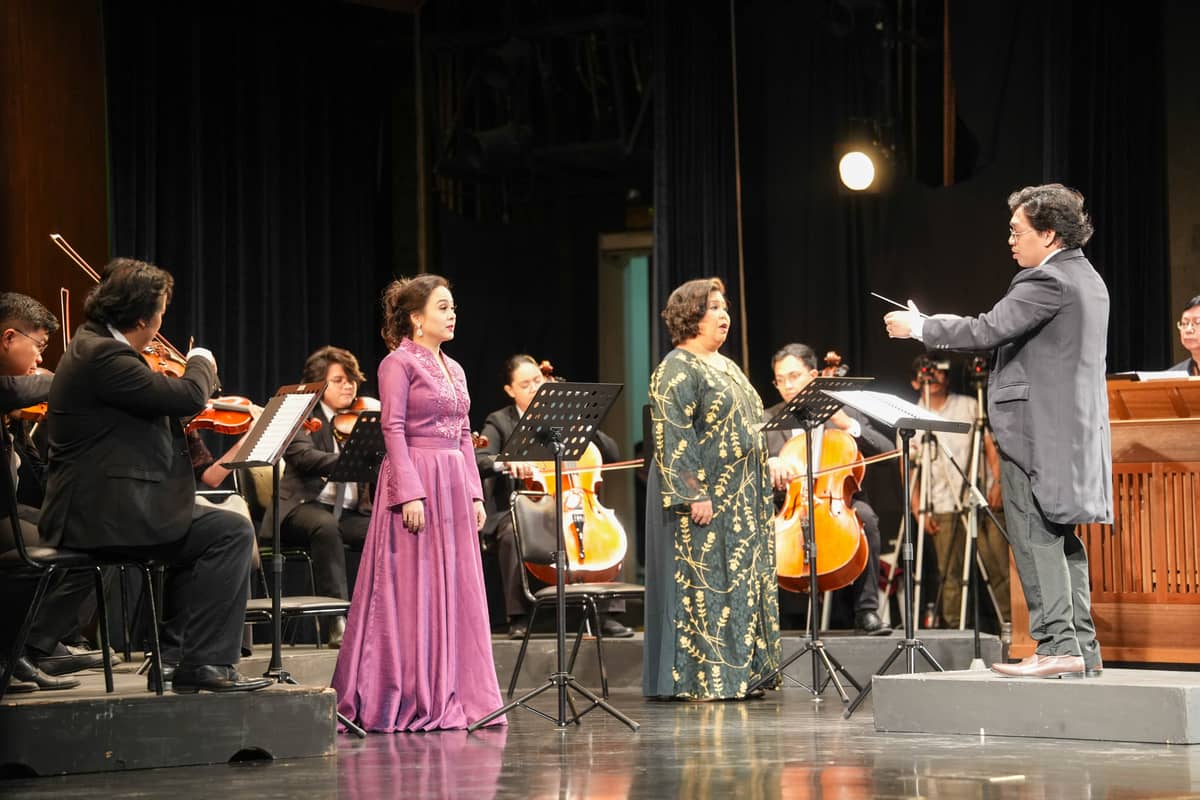 Sopranos Myramae Menese and Camille Lopez Molina with the St. Scholastica Chamber Orchestra.